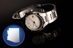 arizona a wristwatch on a black background, with reflection