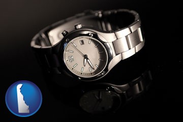 a wristwatch on a black background, with reflection - with Delaware icon