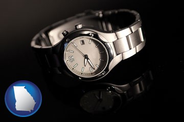 a wristwatch on a black background, with reflection - with Georgia icon