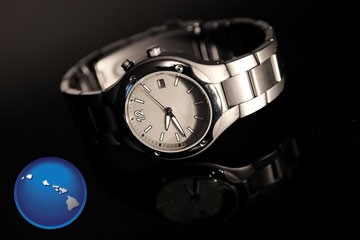 a wristwatch on a black background, with reflection - with Hawaii icon