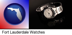 a wristwatch on a black background, with reflection in Fort Lauderdale, FL