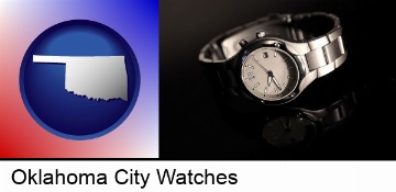 a wristwatch on a black background, with reflection in Oklahoma City, OK