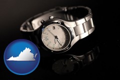 virginia map icon and a wristwatch on a black background, with reflection
