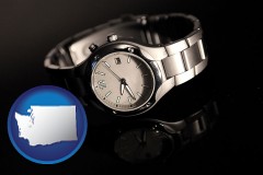 washington map icon and a wristwatch on a black background, with reflection